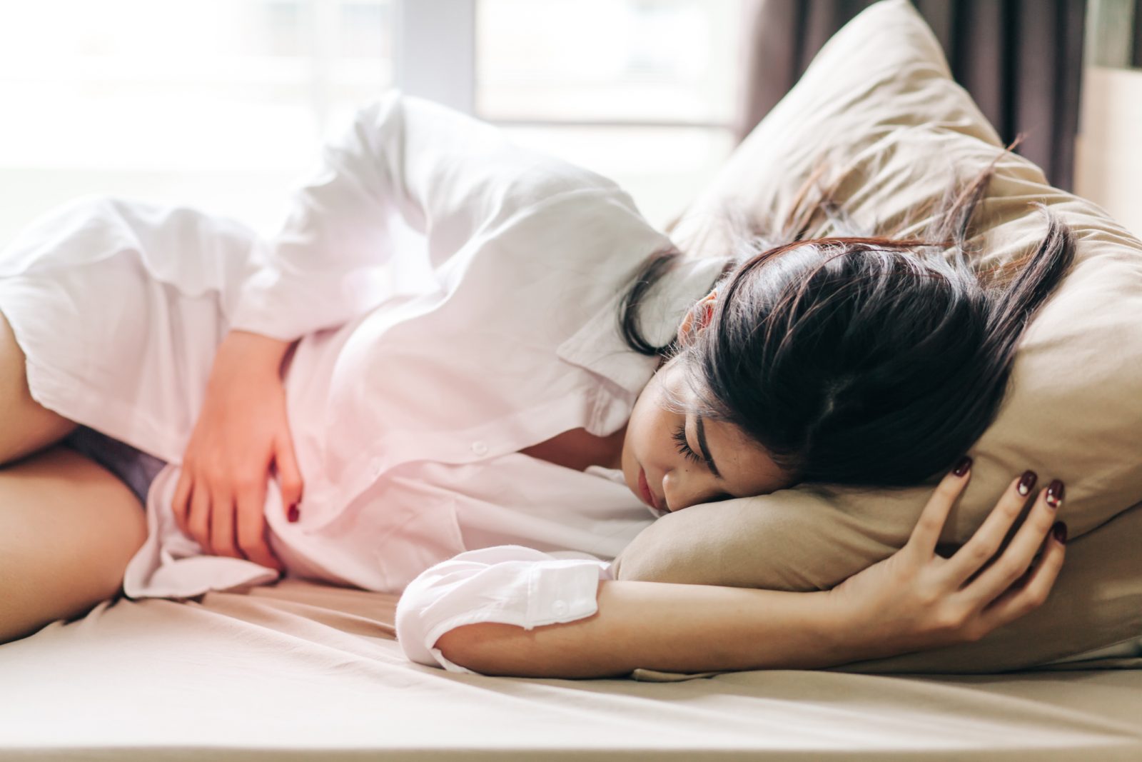 生理痛で悩む女性