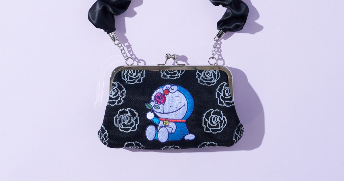[なっち ] ANNA SUI×ドラえもん - がま口バッグ ANNA SUI NYC（アナ スイ エヌ ワイ シー）の「ドラえもん